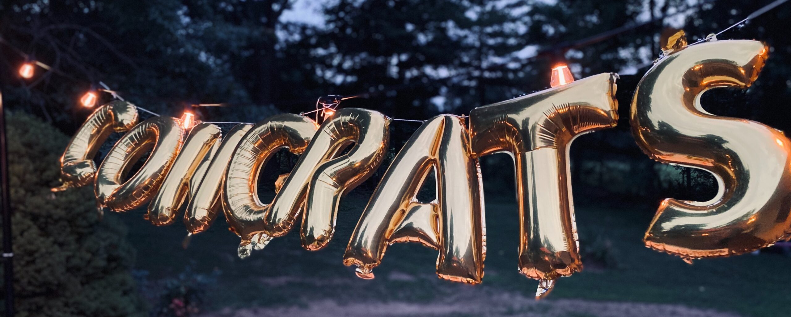 Congratulations sign in gold balloons